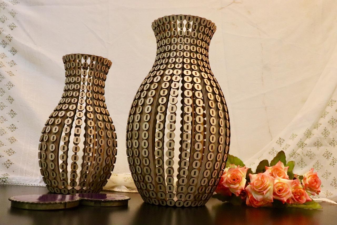 Handcrafted wooden vase with button detailing, featuring elegant floral arrangement, ideal for office reception areas and minimalist decor.